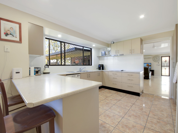 Large Family Home | 1020m2 Block | Walk to Genesis College, Shops and room for the tradies